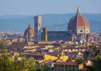 Florence, Tuscany, Italy. View over the city to the Duomo - Cathedral of Santa Maria del Fiore - and Campanile from the Piazzale Michelangelo